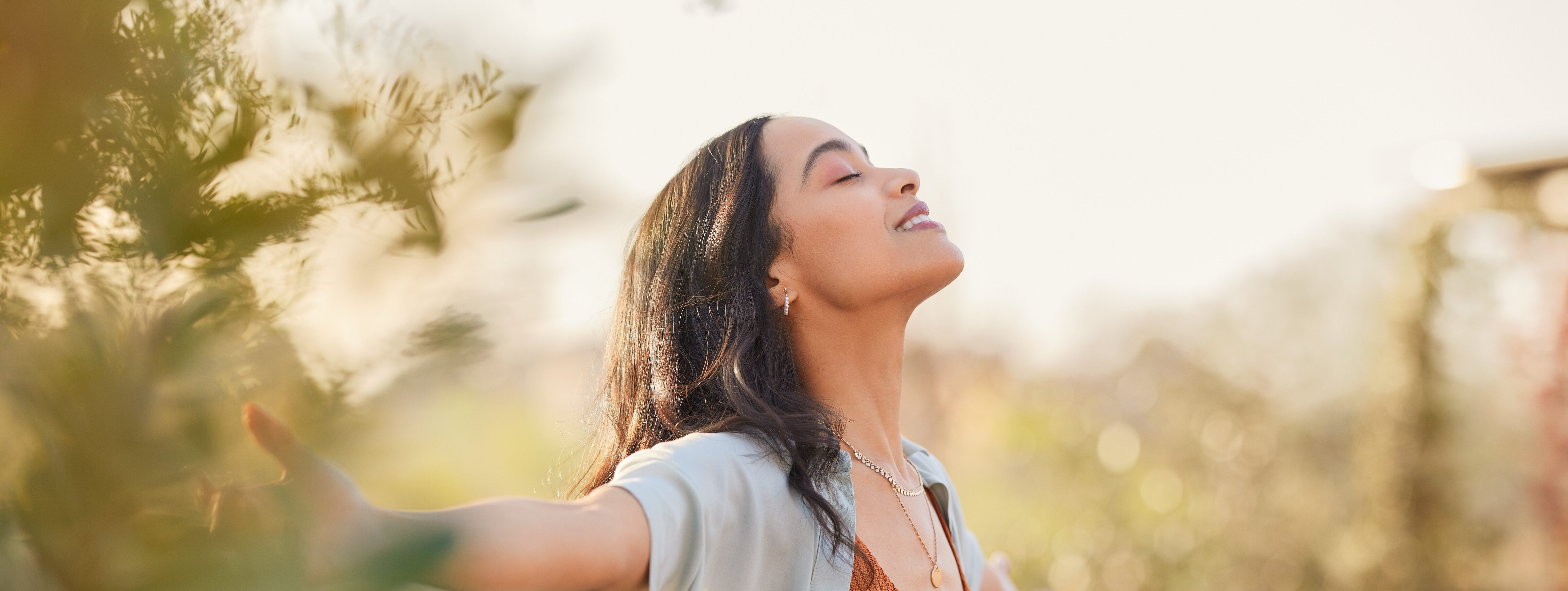 Woman enjoying fresh air after dental treatment